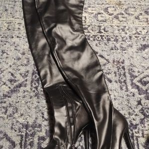 Thigh high black boots